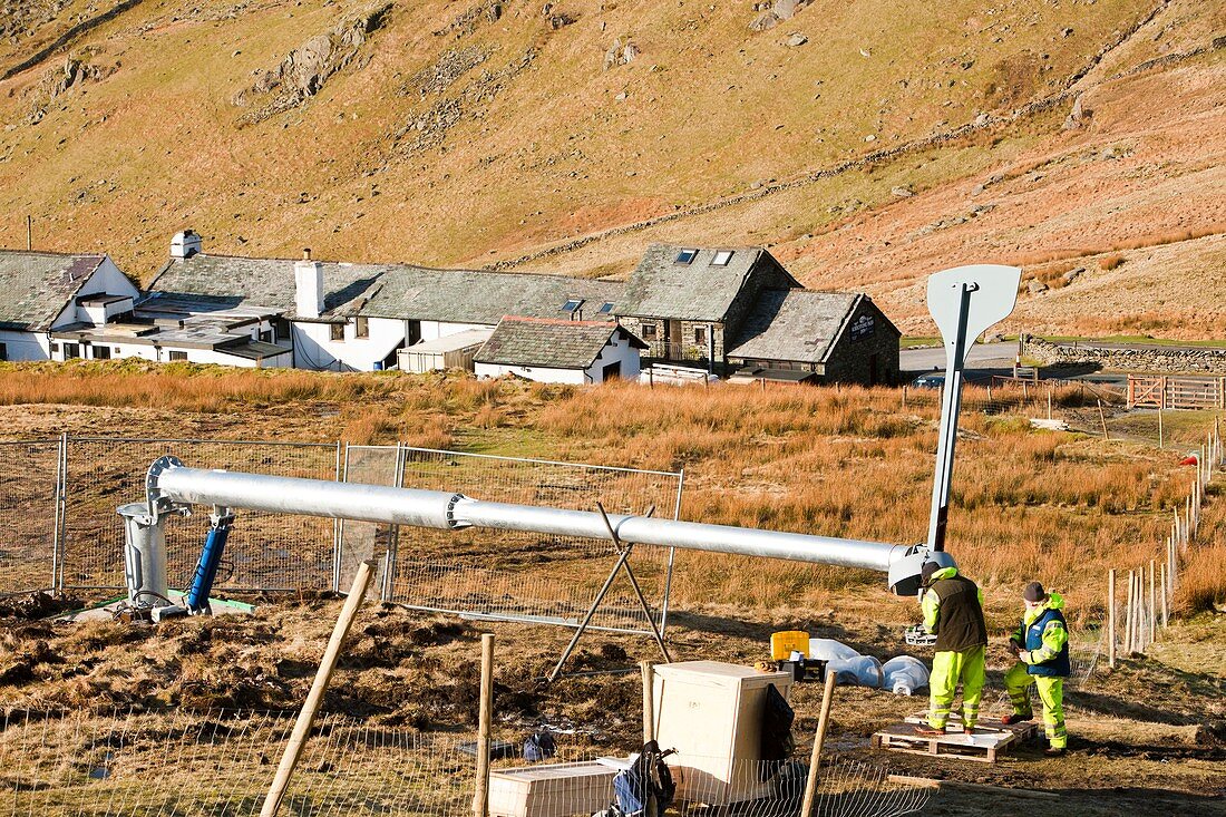 Three wind turbines being constructed