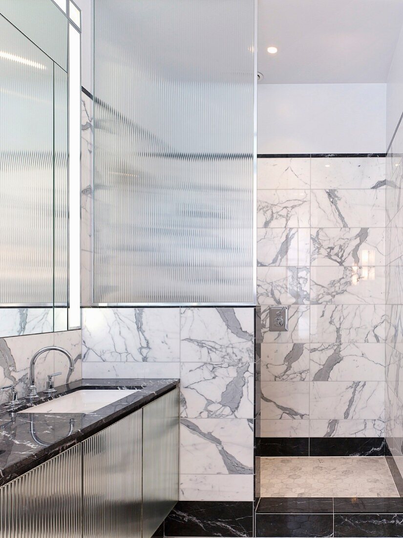 Elegant marble bathroom with shower area