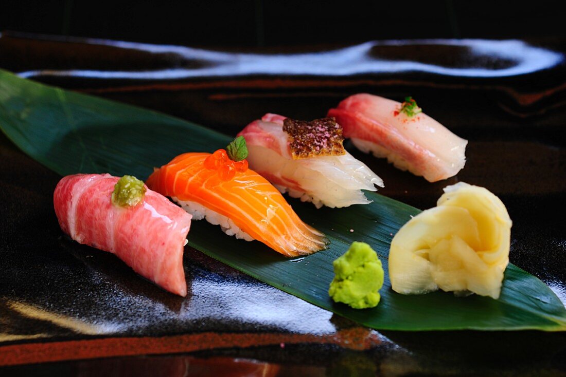 A sushi platter with wasabi and ginger