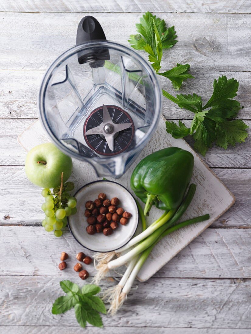 A view of the inside of a blender and ingredients for smoothies