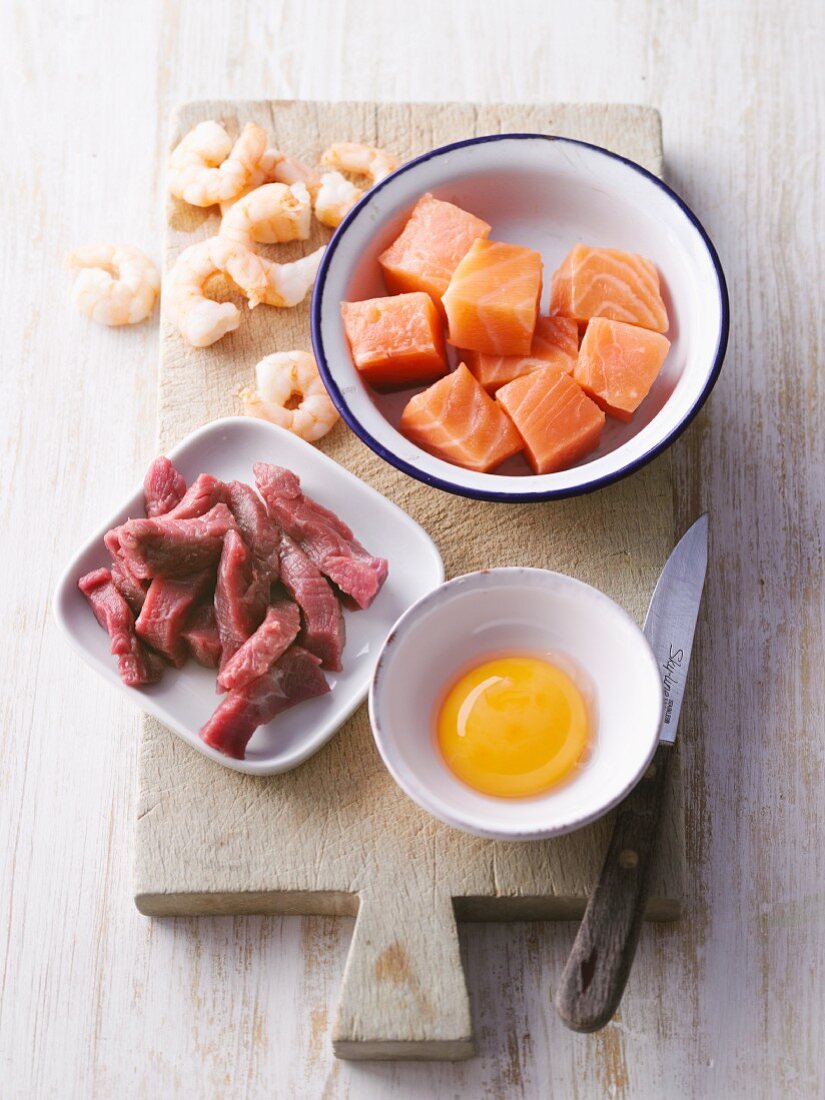 Prawns, salmon, beef and egg for adding protein to vegetable broth