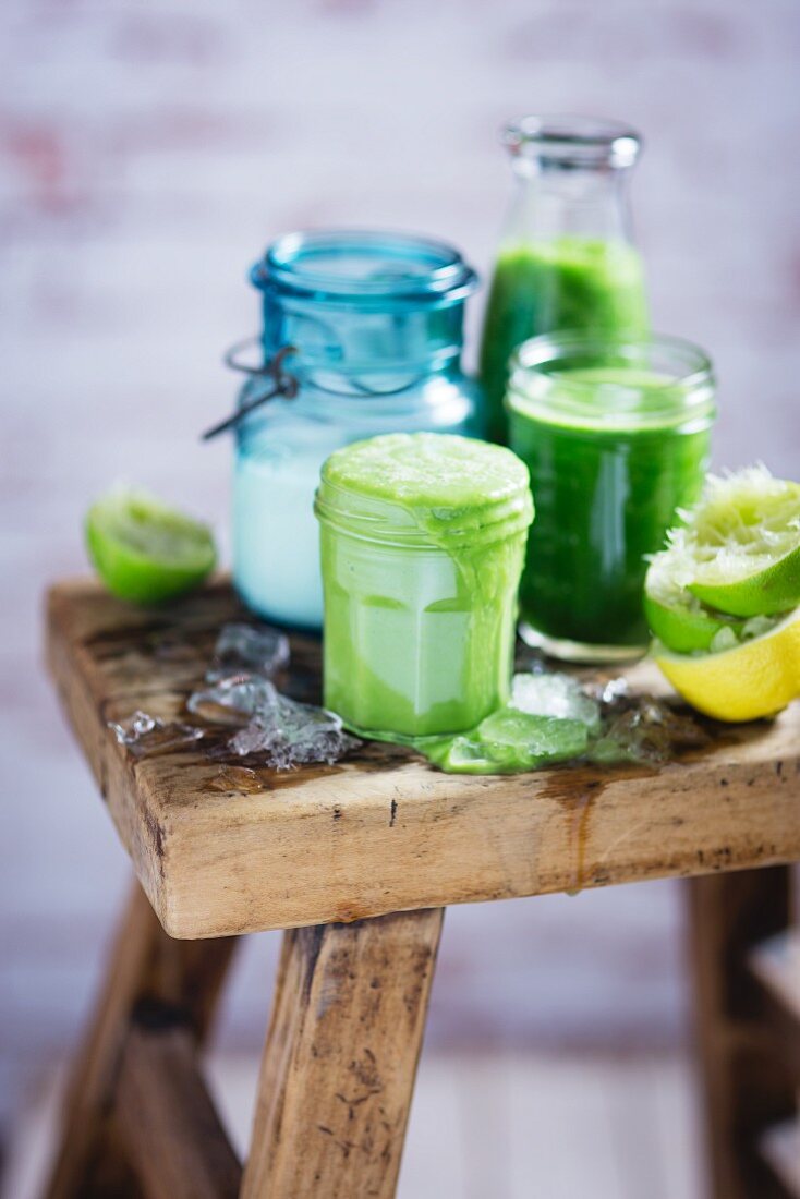 Green smoothies on a wooden table