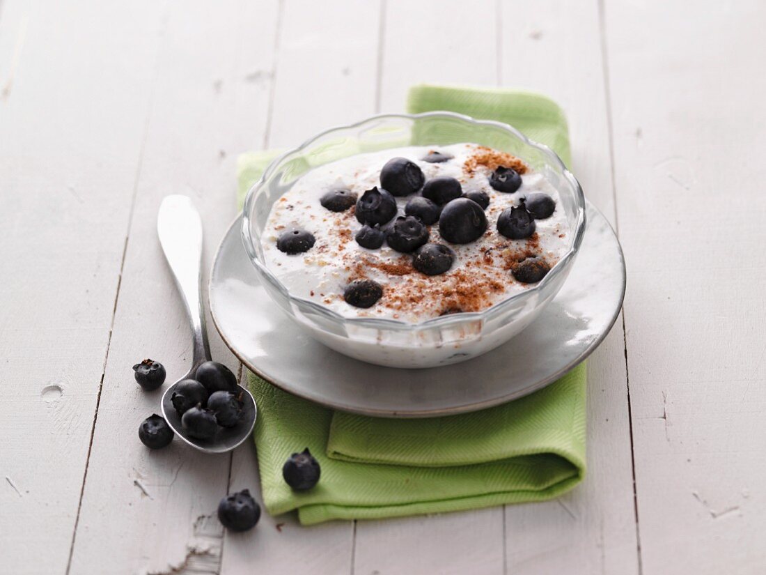 Yoghurt with blueberries and ground hazelnuts
