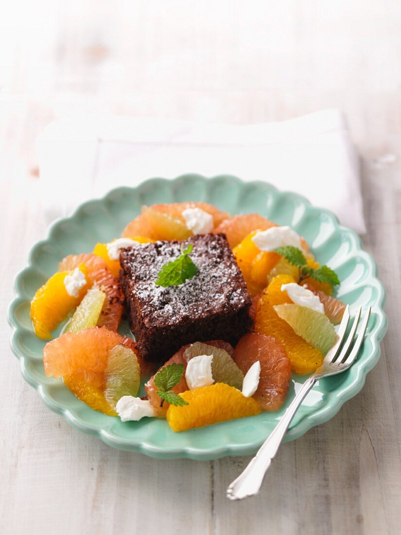 A brownie with citrus compote and goat's cream cheese