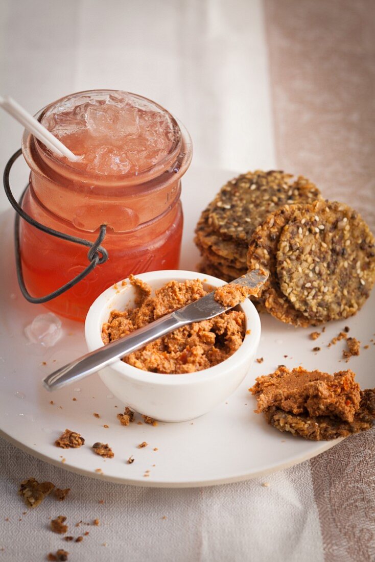 Wholegrain crackers with sage and walnut pate and a kombucha cocktail