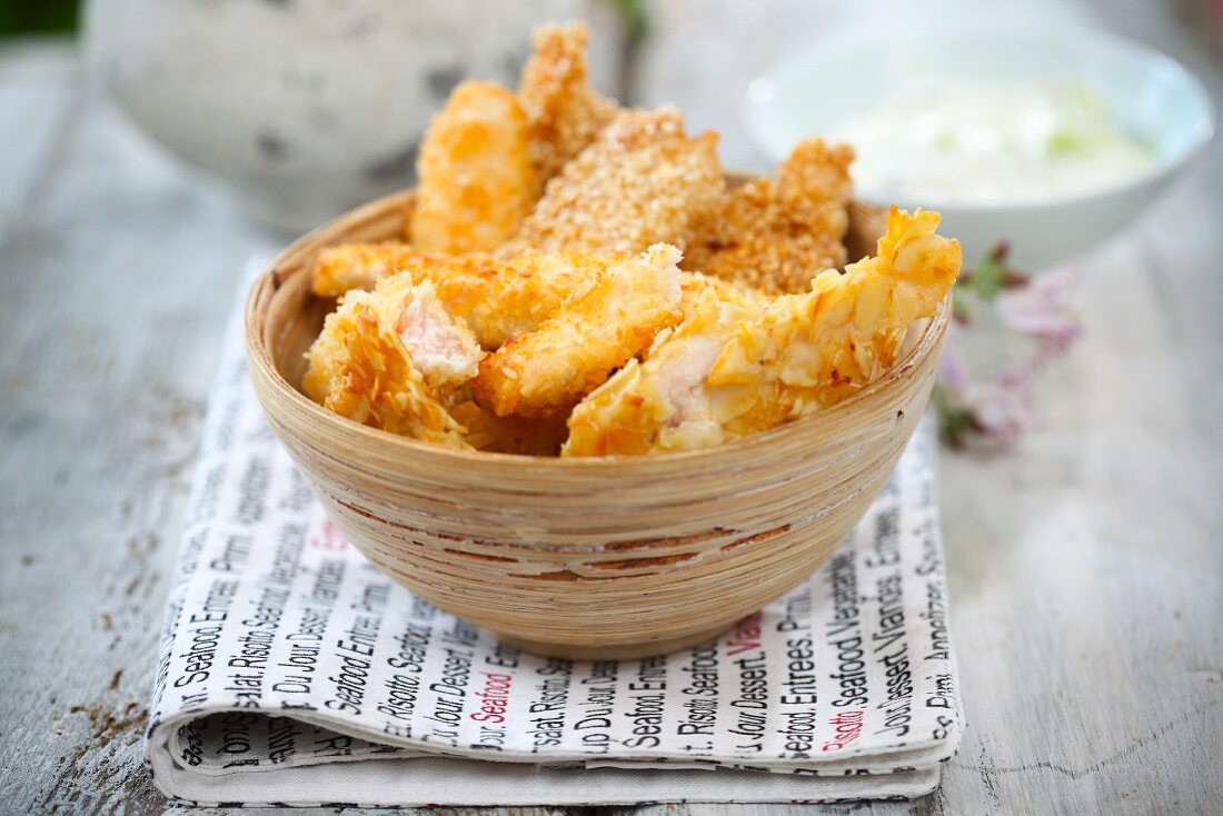 Chicken strips with an almond coconut coating