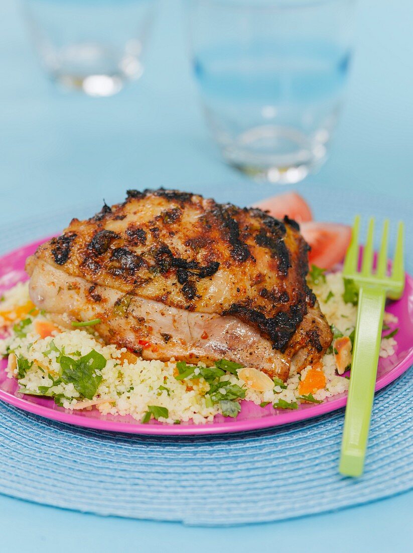 Grilled chicken served with couscous