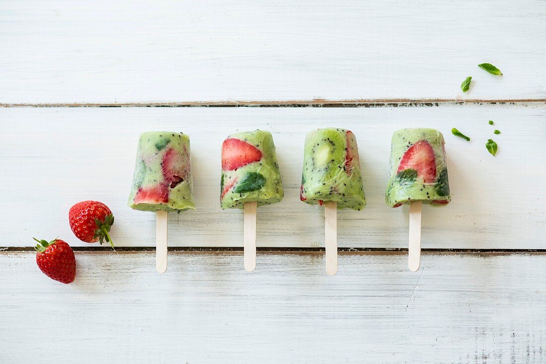 Homemade kiwi and strawberry ice cream sticks