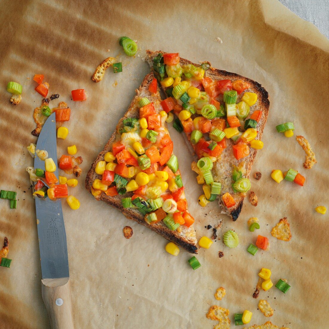 Toast topped with sweetcorn, peppers and spring onions