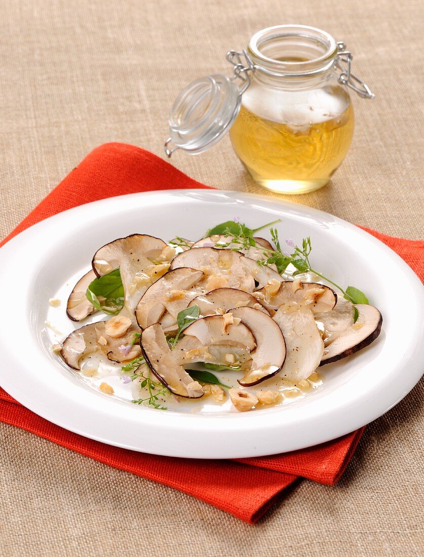 Porcini mushroom carpaccio with hazelnuts