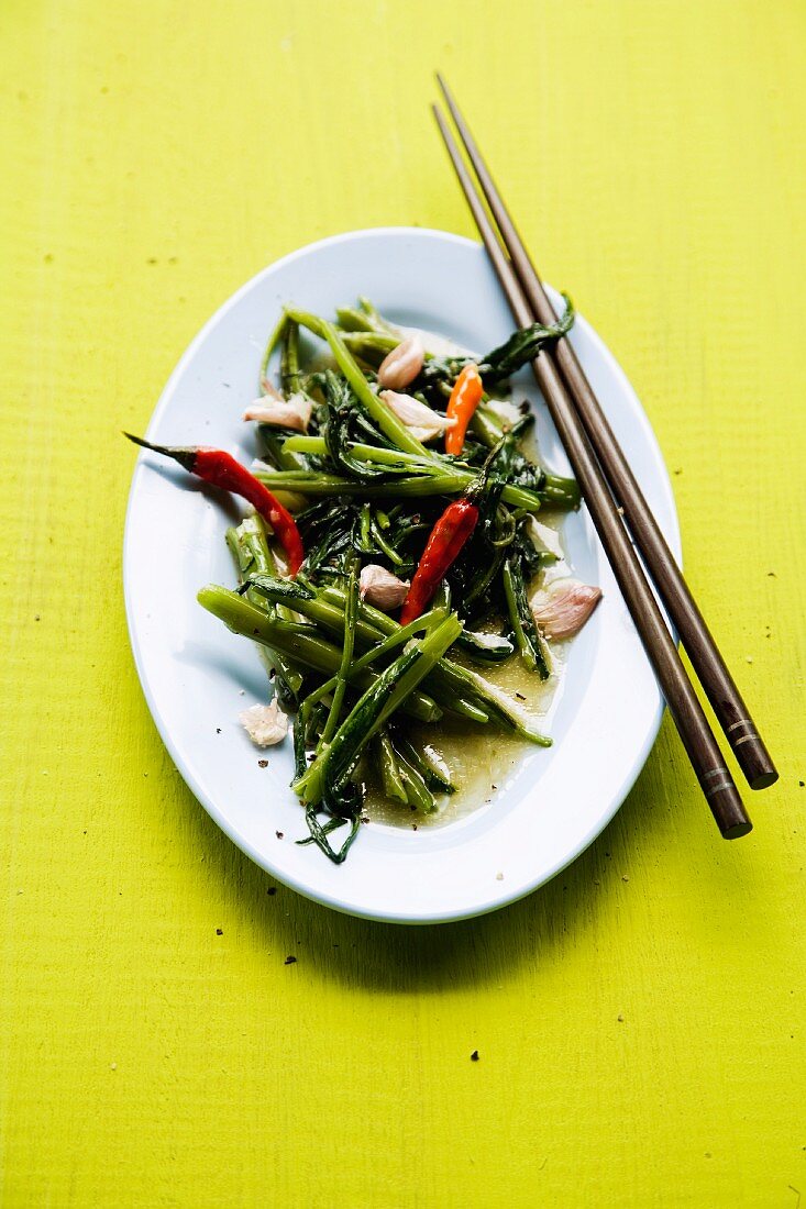 Pak Bung Fai Deng (water spinach with garlic and chilli, Thailand)