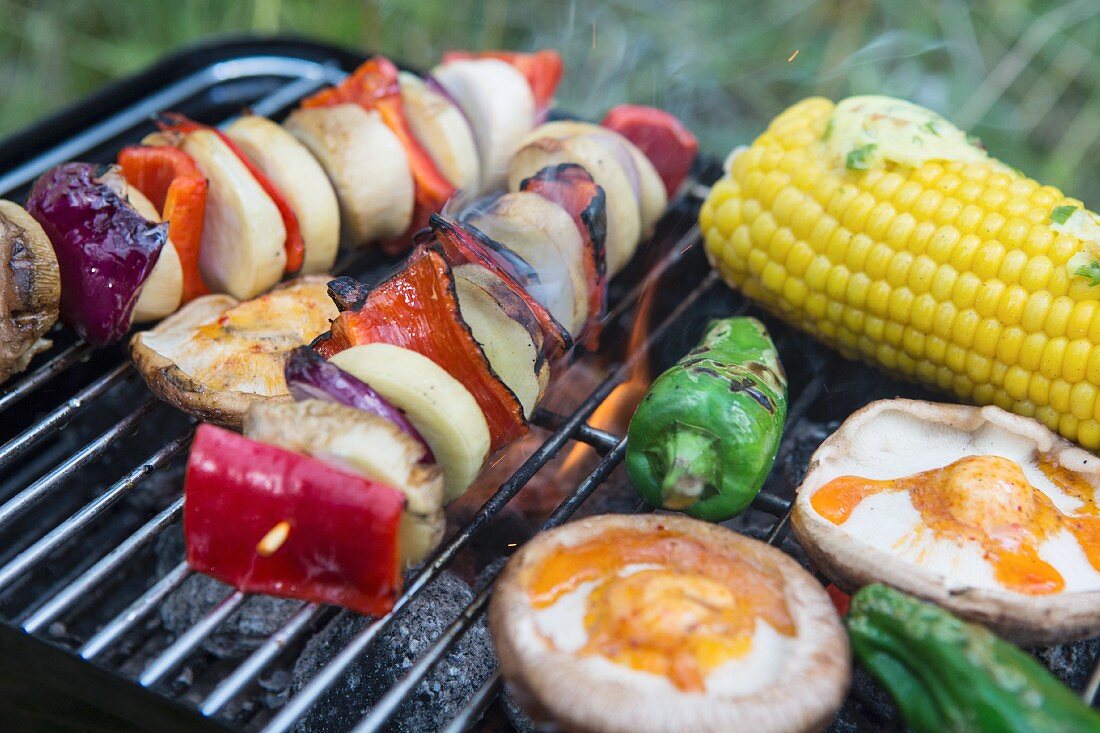 Vegetables and mushrooms on a barbecue