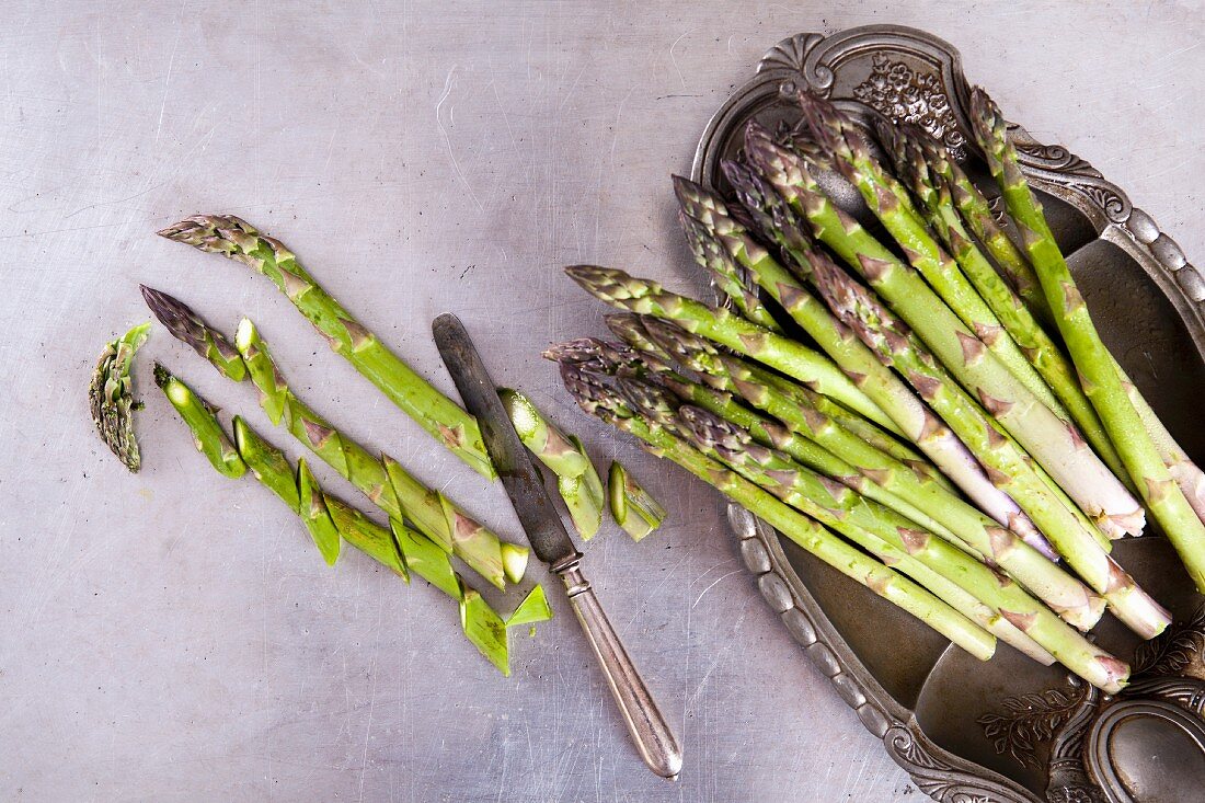 Green asparagus, partially sliced