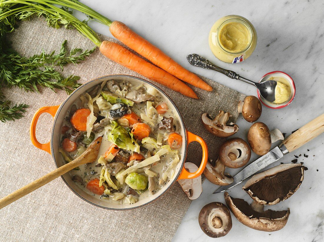 Veal casserole with carrots, mushrooms and mustard
