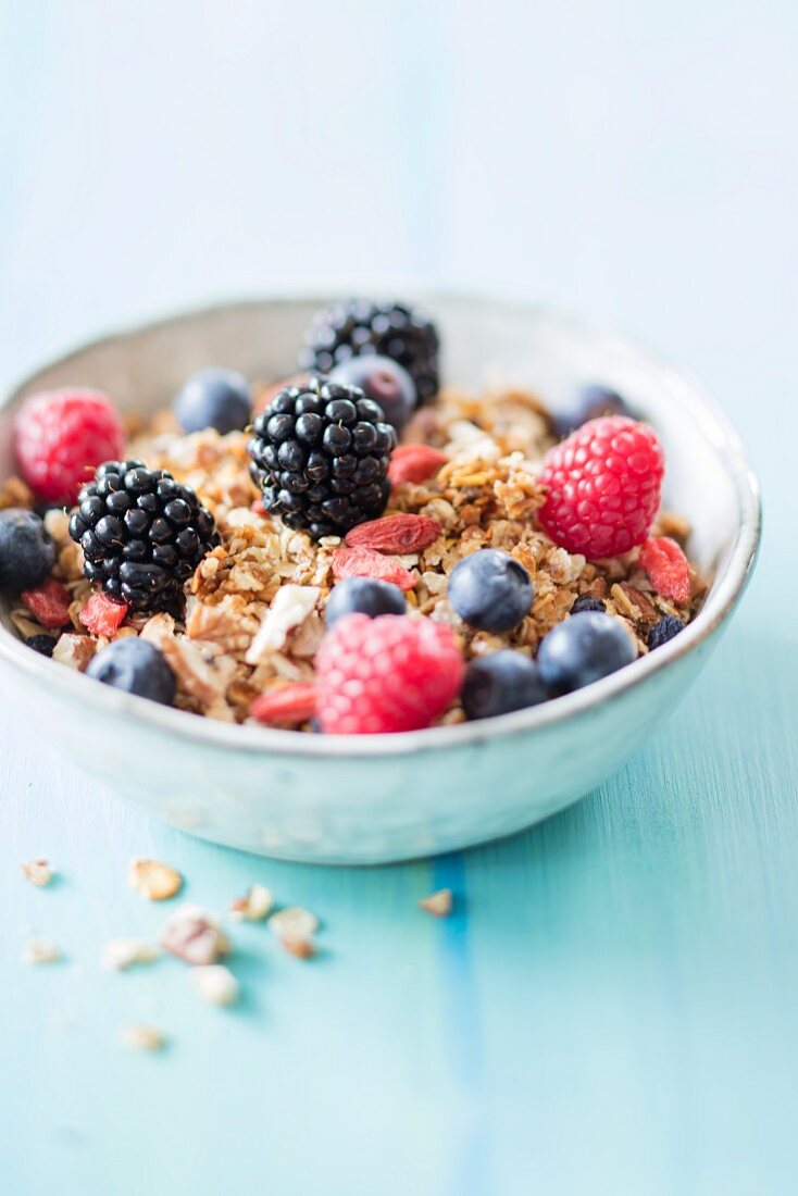 Gluten-free vegan granola muesli with aronia berries and goji berries