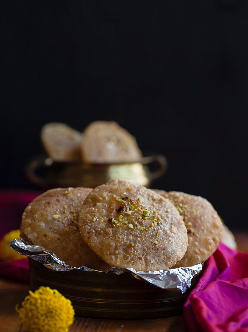 Stuffed unleavened bread with coconut and jaggery (Asia)