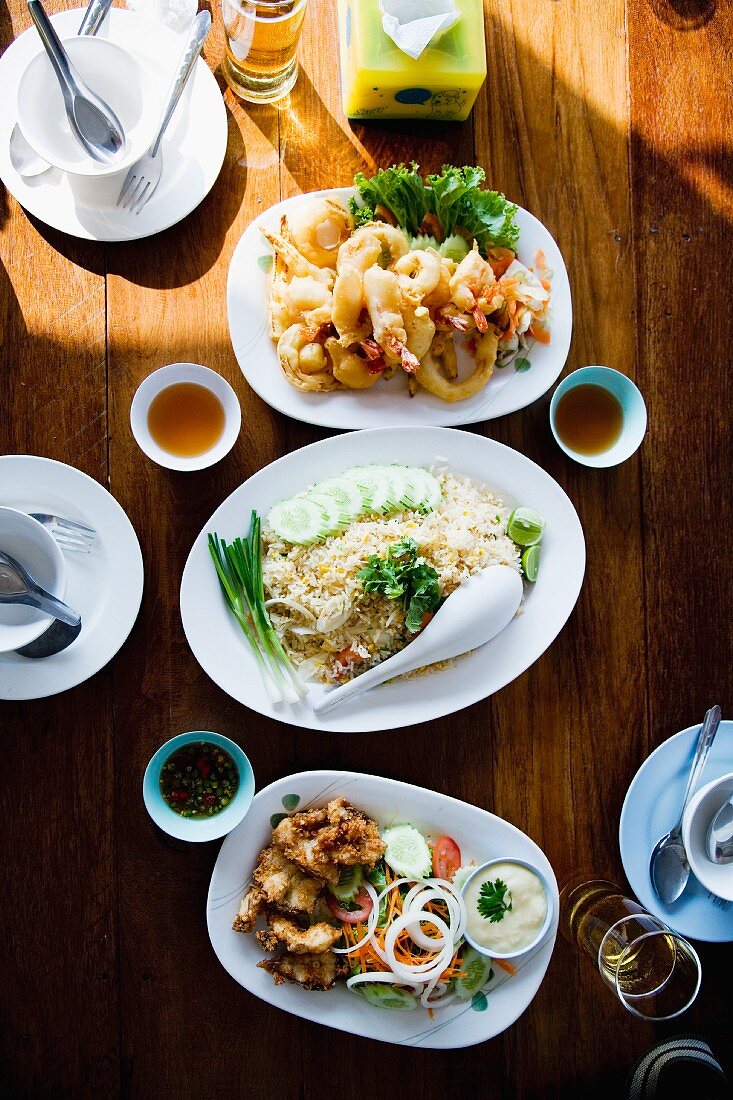 Three Thai dishes on a table