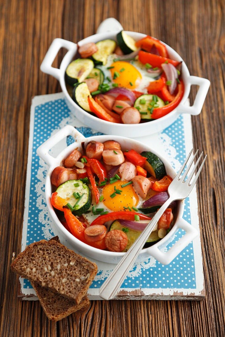 Sausage and vegetable bakes with fried eggs