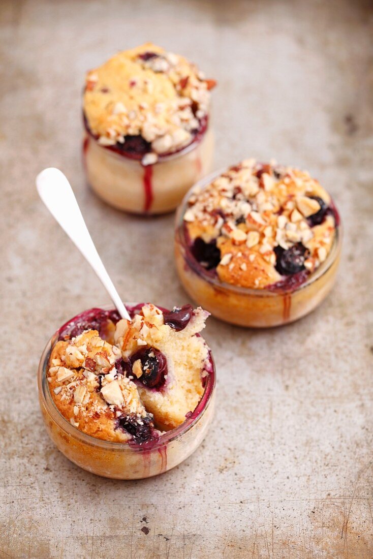 Almond muffins with blueberries baked in glasses