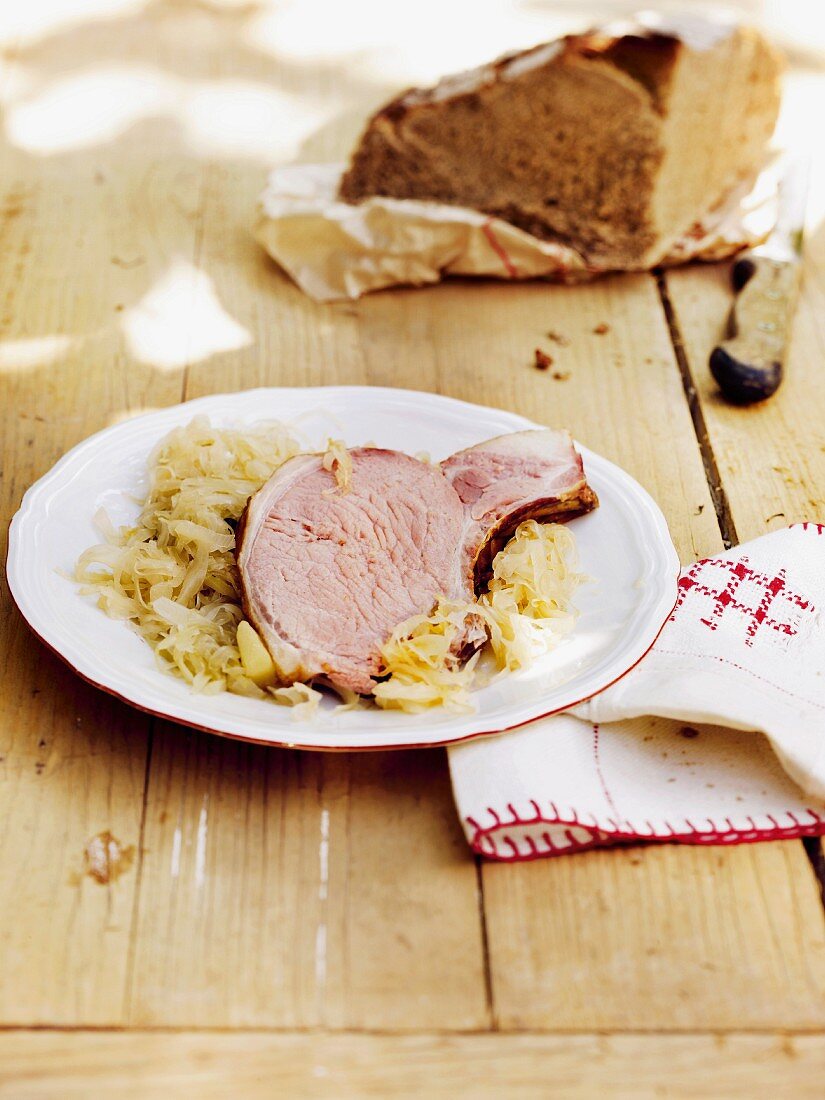 Gammon steak with sauerkraut and bread