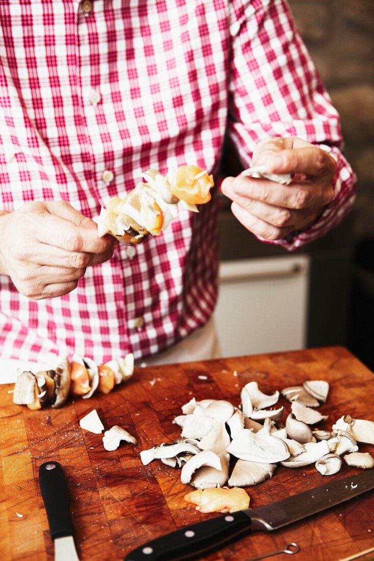 Mushroom kebabs being made