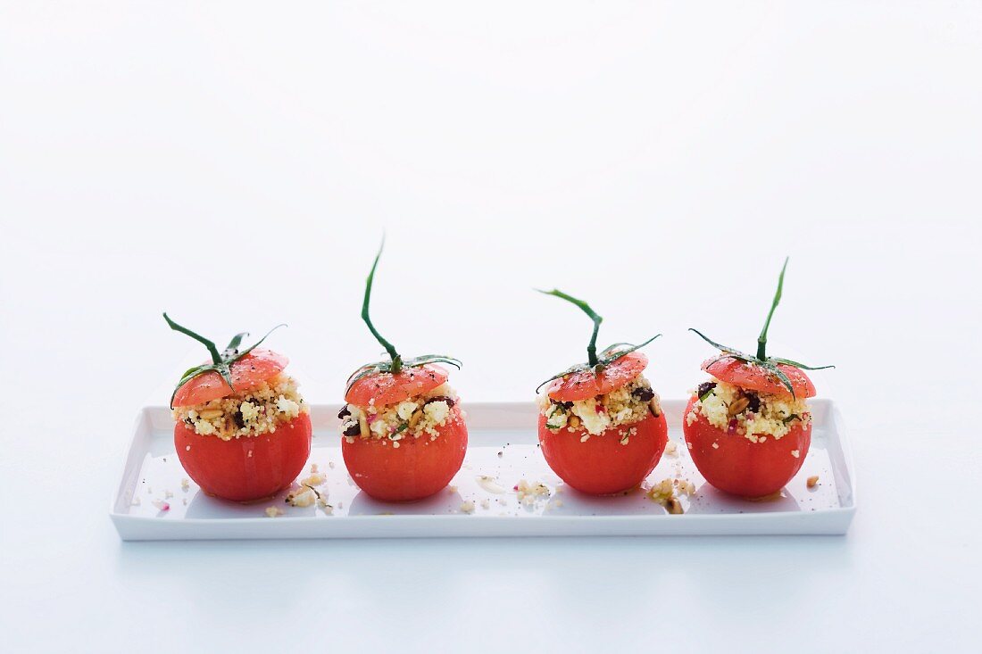 Tomatoes filled with couscous salad