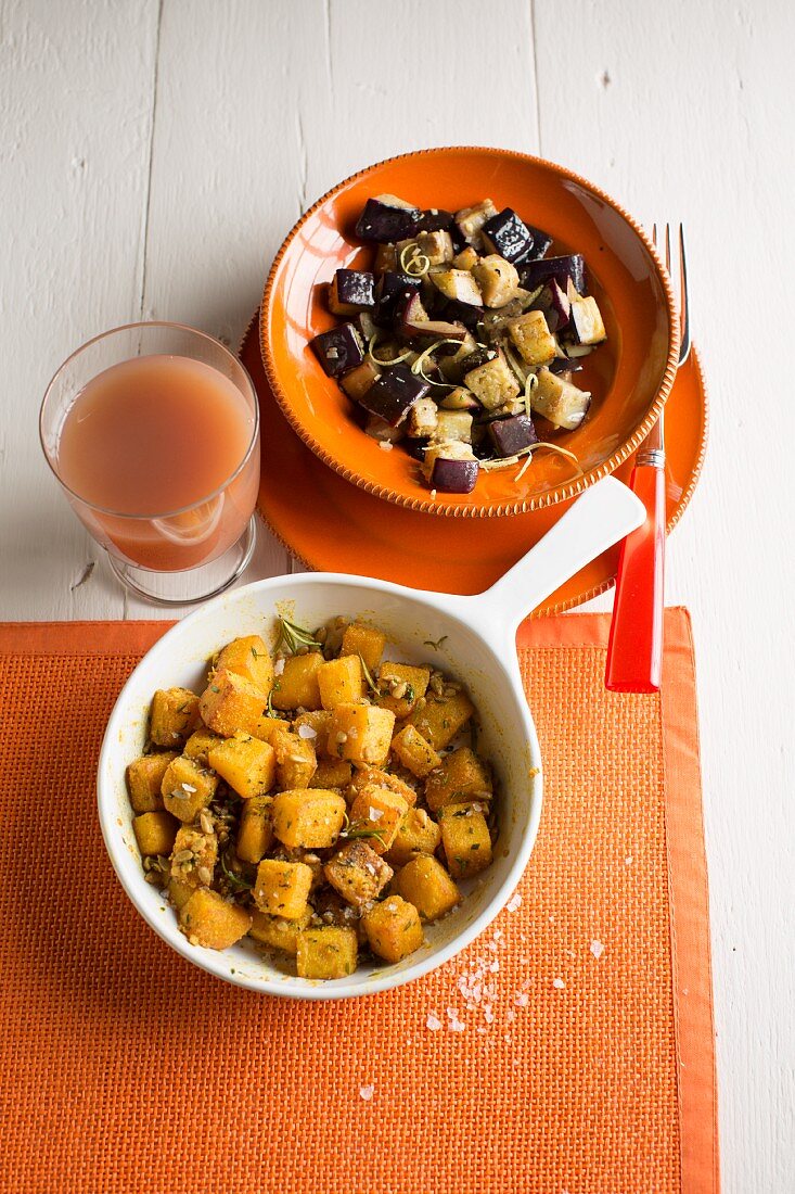 Glazed aubergines and fried potatoes with sweetcorn and turmeric