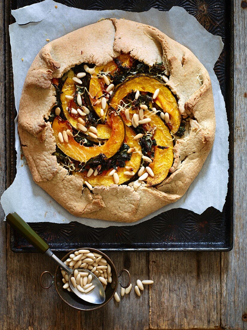 Squash and kale galette with pine nuts