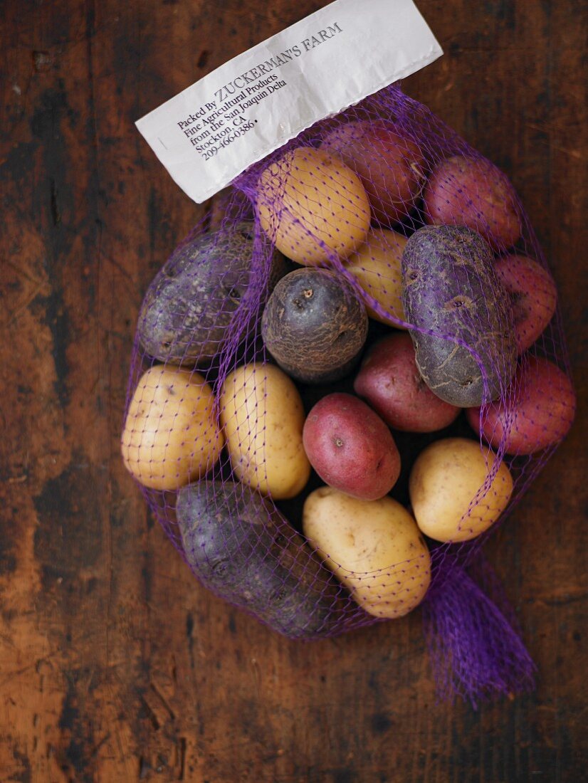 Various potatoes in a net