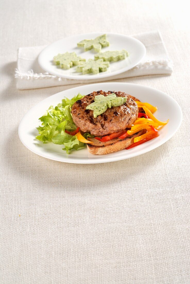 A veal burger on toast with herb butter