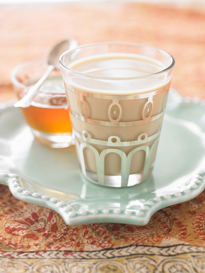 A glass of chai tea