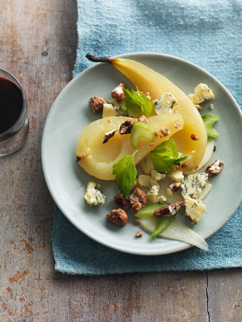 Poached pears with Stilton, celery and walnuts