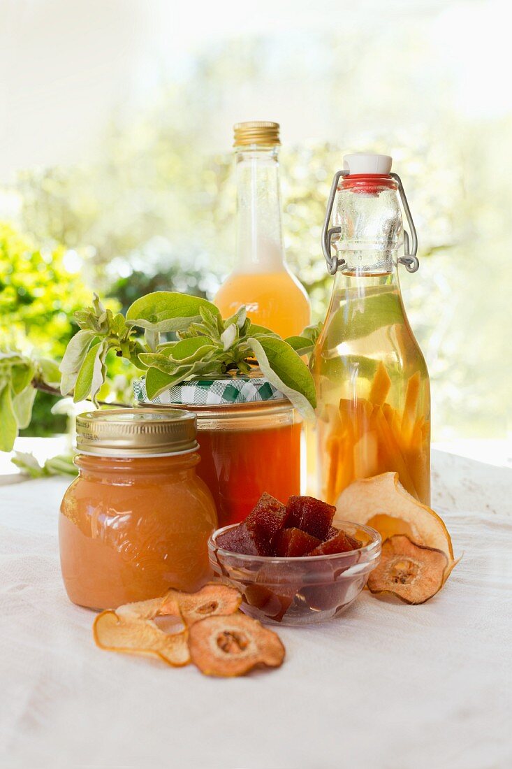 A still life with various homemade quince products