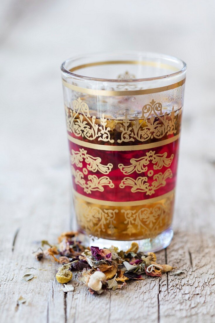 Lebanese flower tea in an oriental tea glass