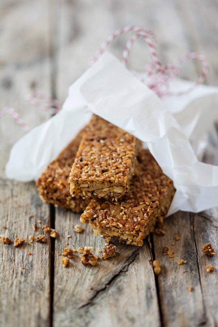 Gluten-free vegan muesli bars with nuts and lupine flakes