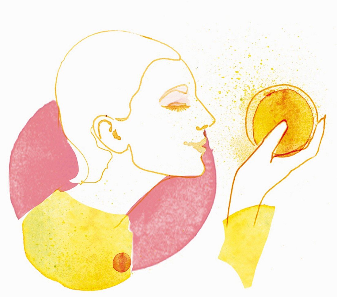 Woman holding an orange