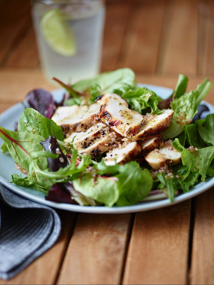 A salad with grilled buttermilk chicken