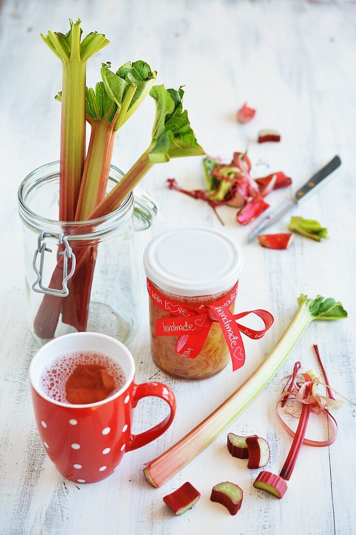 Homemade rhubarb compote in a cup and in a jar