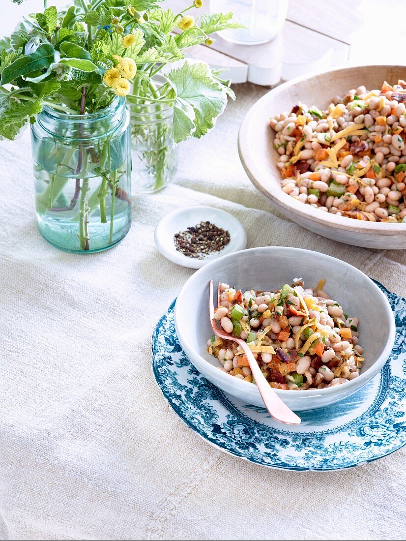White bean salad with Cheddar cheese, bacon and walnuts