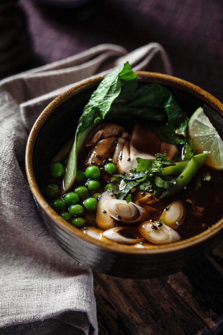 Vegetable soup with peas and bok choy