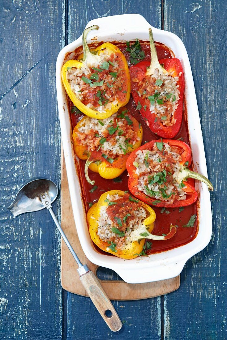 Peppers filled with minced meat and rice in a tomato sauce