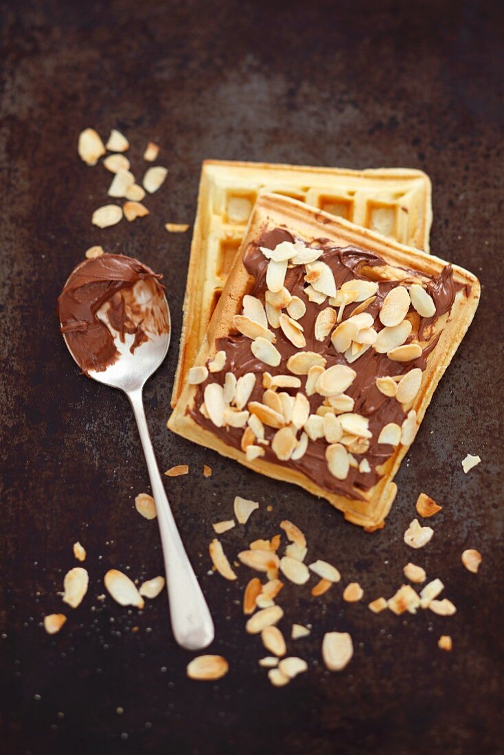 Waffles with chocolate cream and flaked almonds