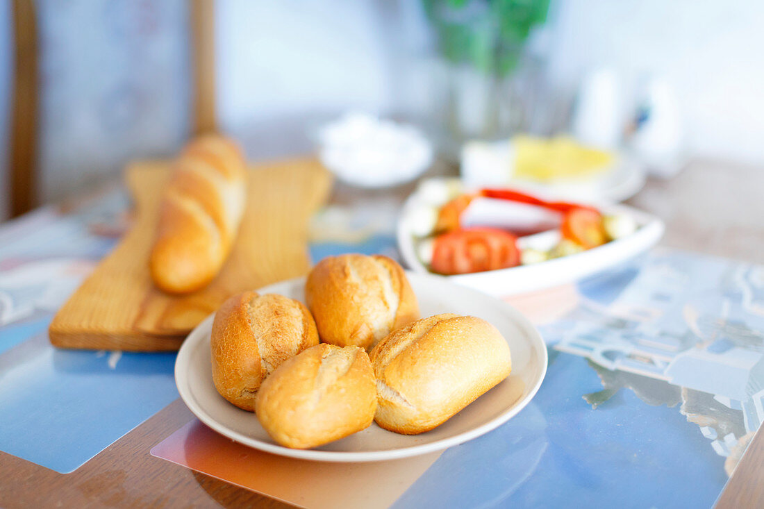 Fresh bread rolls on the table