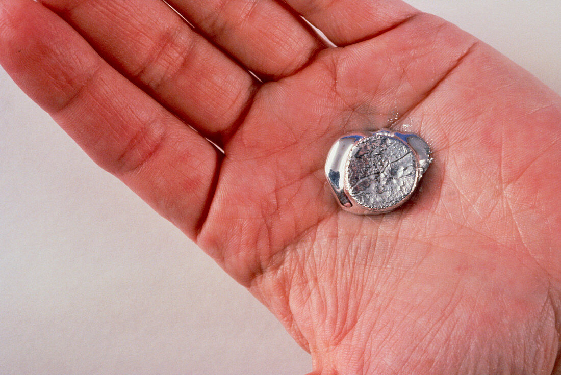A piece a Gallium melting in the hand