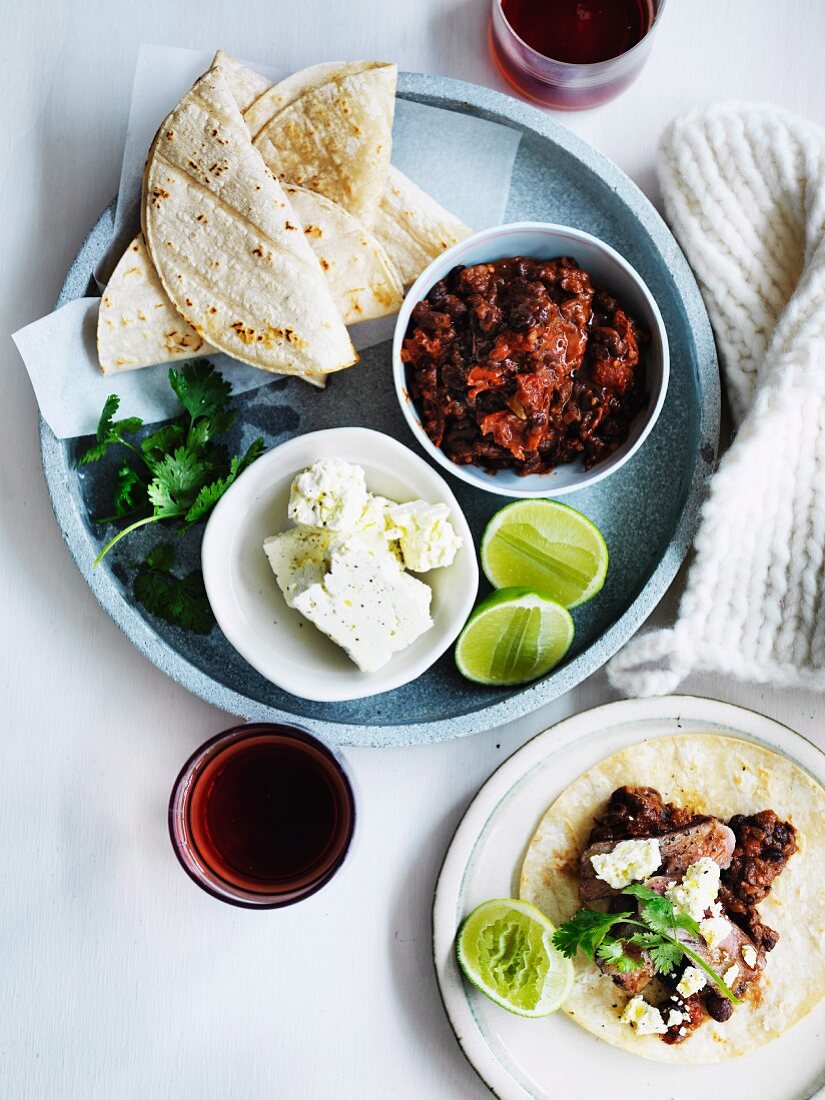 Soft tacos with black bean mole and flank steak