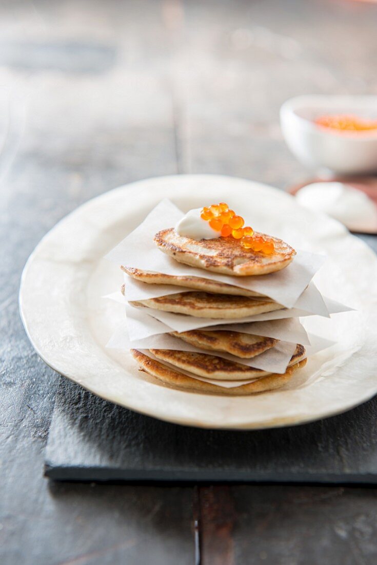 Blintzes with trout caviar