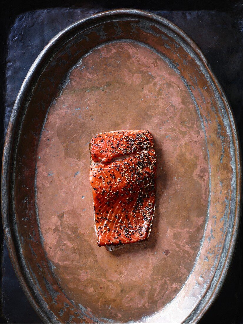 Smoked salmon on a copper plate