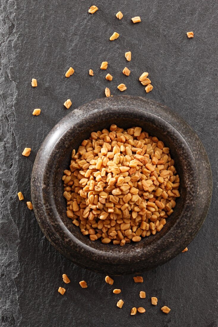 Fenugreek seeds in a mortar