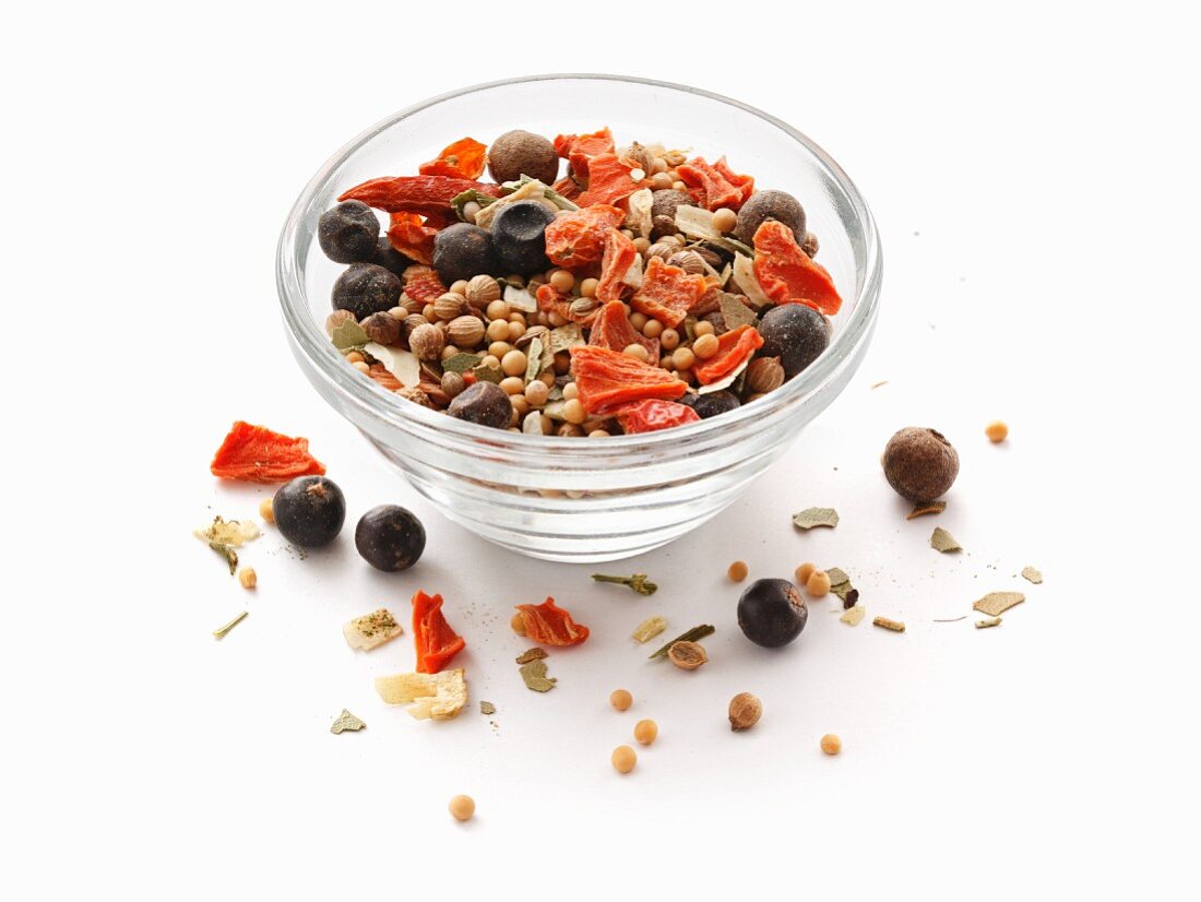 A mixture of preserved spices in a glass bowl