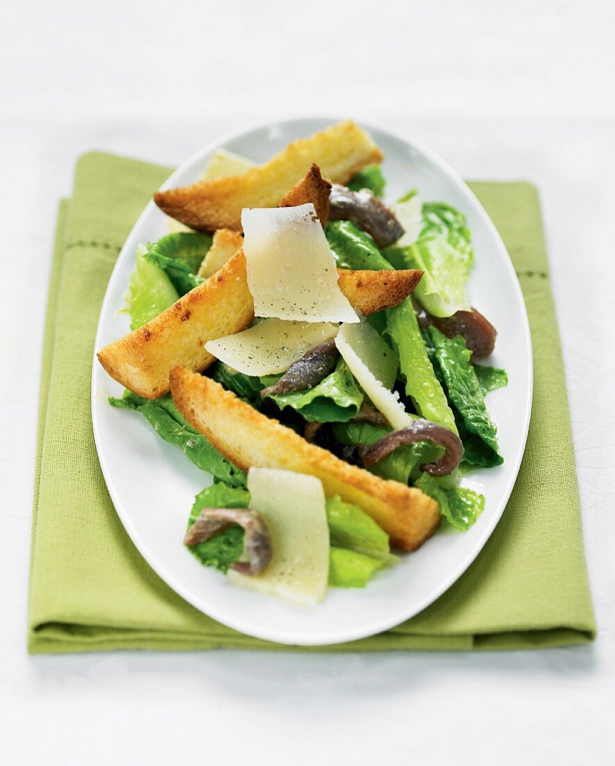Caesar salad with crouton sticks, anchovies and Parmesan cheese